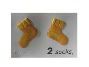 Embossed socks on a counting-book page